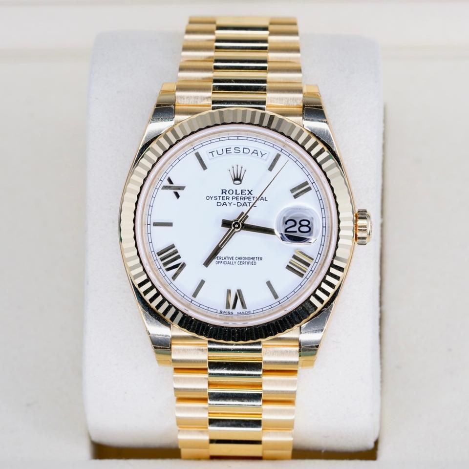 Rolex Day-Date 40 New Old Stock White Roman Dial Yellow Gold President 2018, 228238 — 1 of 5
