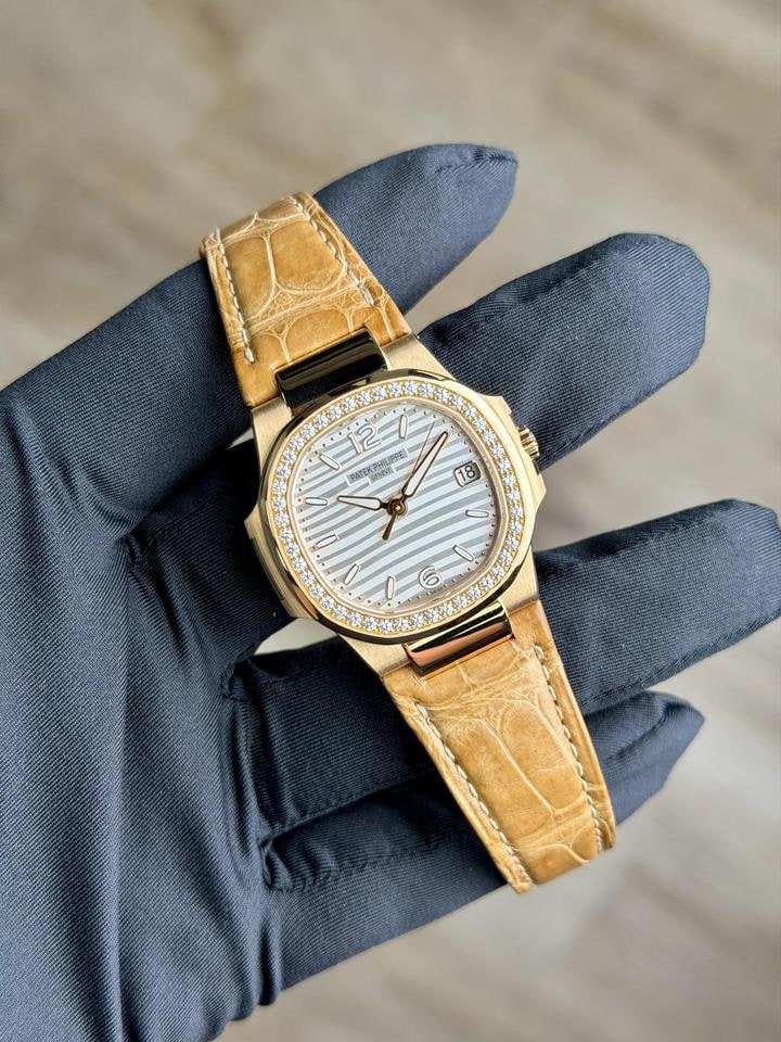 Patek Philippe Nautilus White Index Diamond Bezel Strap 2017, 7010R-013 — 1 of 6